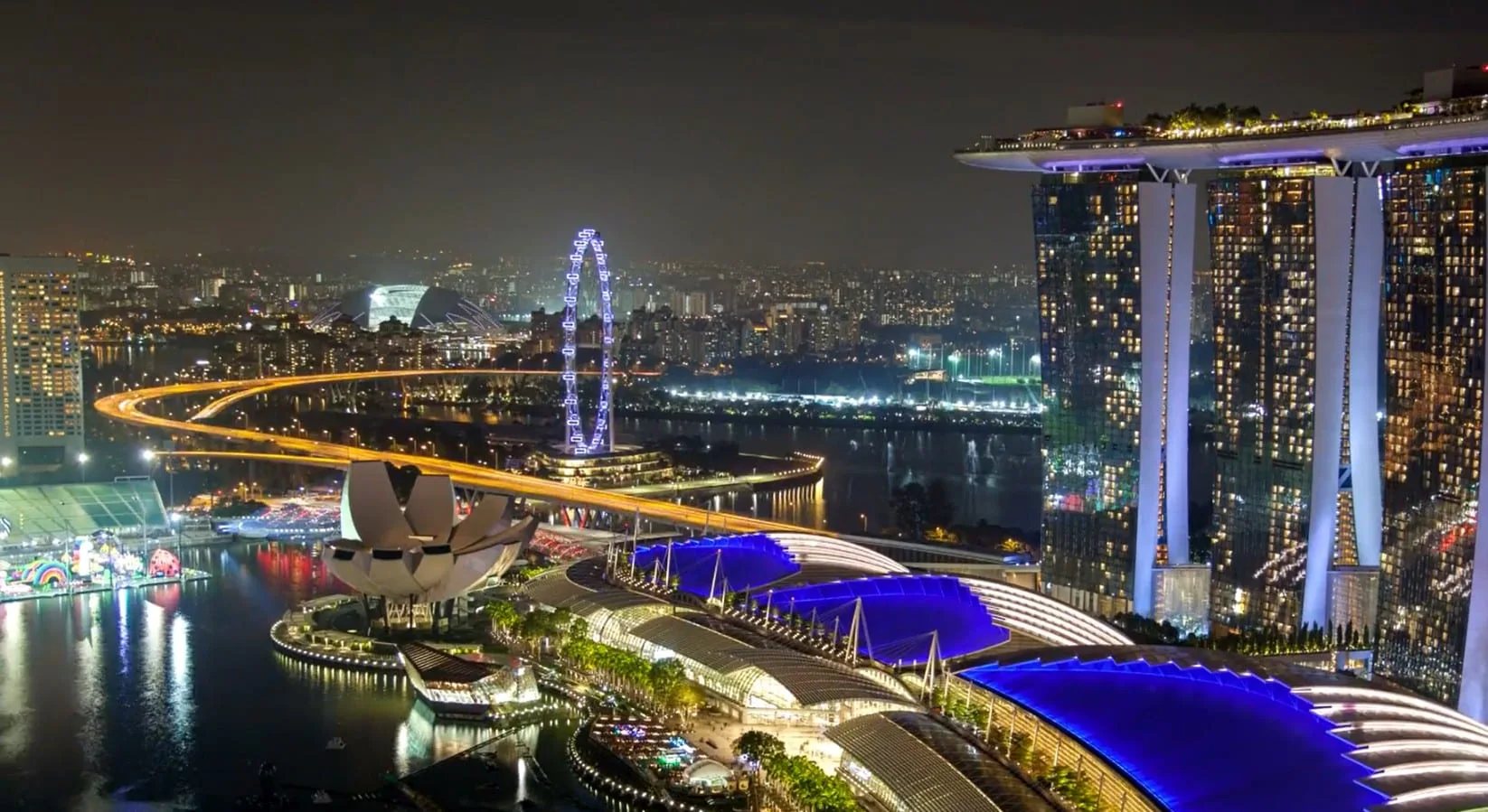 Singapore Marina Bay skyline illuminated at night